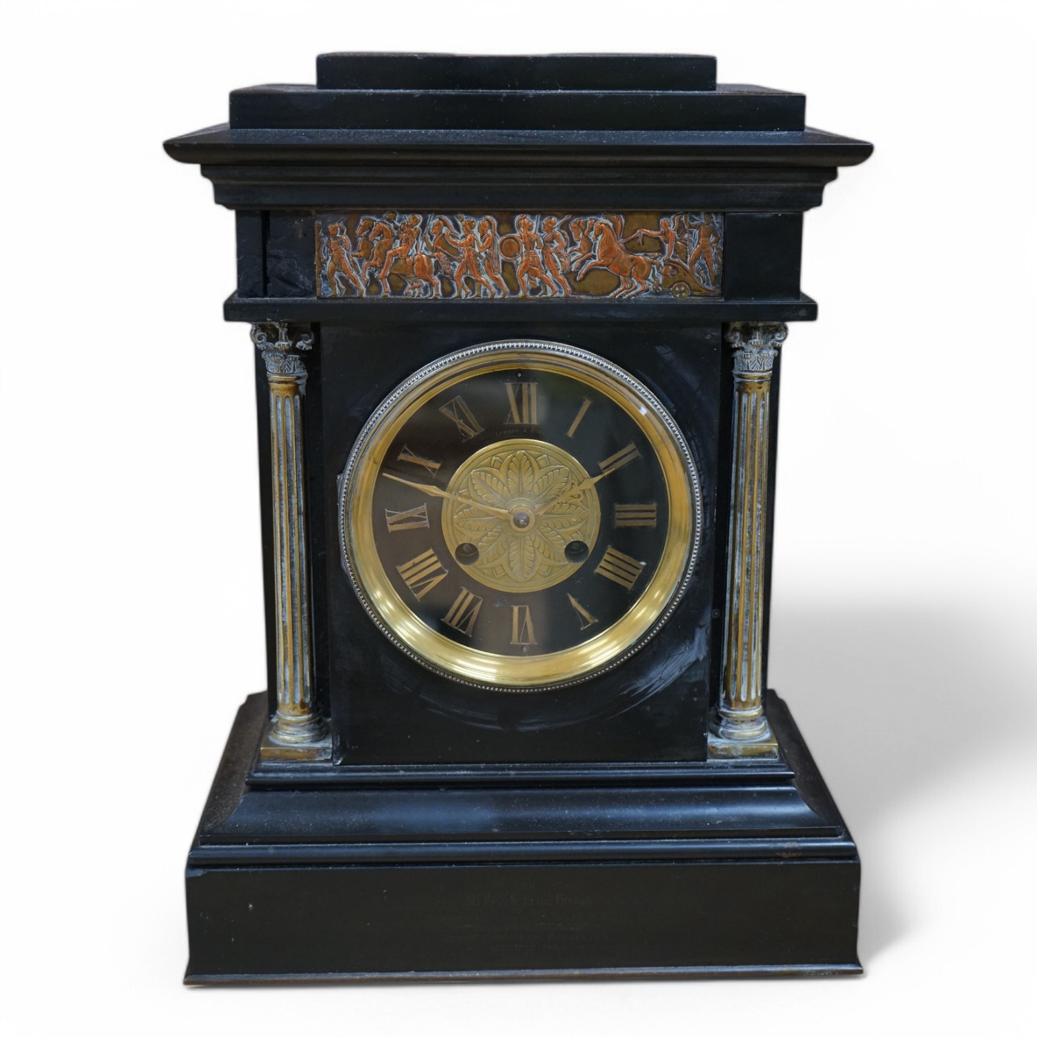 A Victorian slate clock, with copper embossed figural panel, 37cm high. Condition - unknown if working, case good